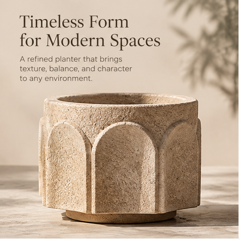 Beige arch relief planter styled with leafy greenery