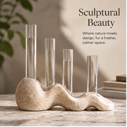 Wave-shaped stone plant vase with clear tubes shown without foliage