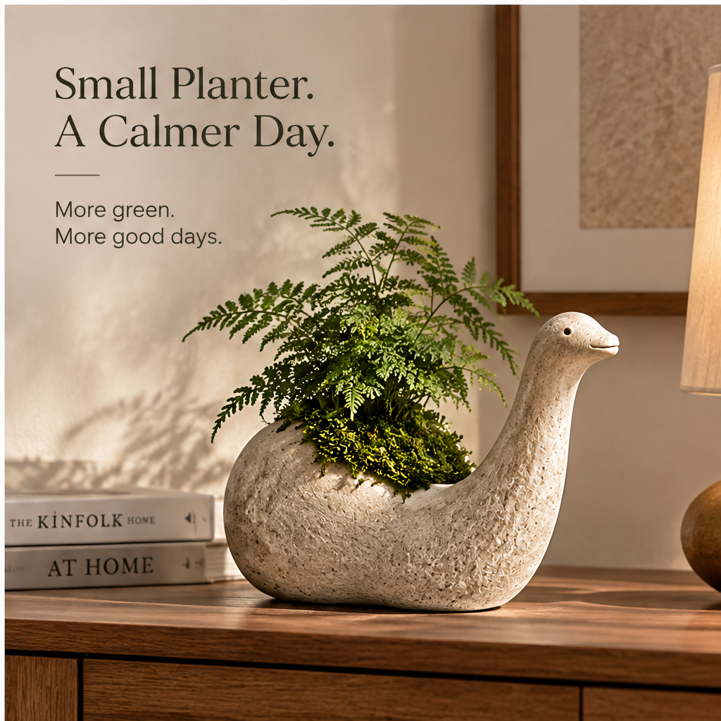 Rear angle of the long-neck planter showing the plant opening and rounded body